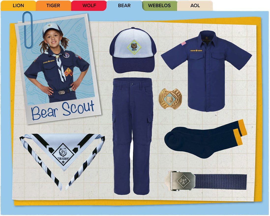 Official Bear uniform: navy button shirt, light-blue-front cap, blue pants, belt, socks, and the light blue Bear neckerchief.