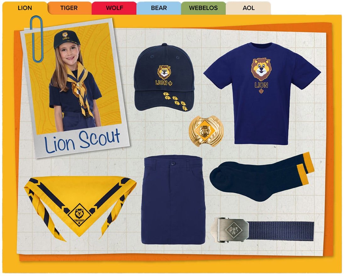 Official Lion uniform: navy Lion T-shirt, cap, blue bottoms, belt, socks, and the yellow Lion neckerchief.